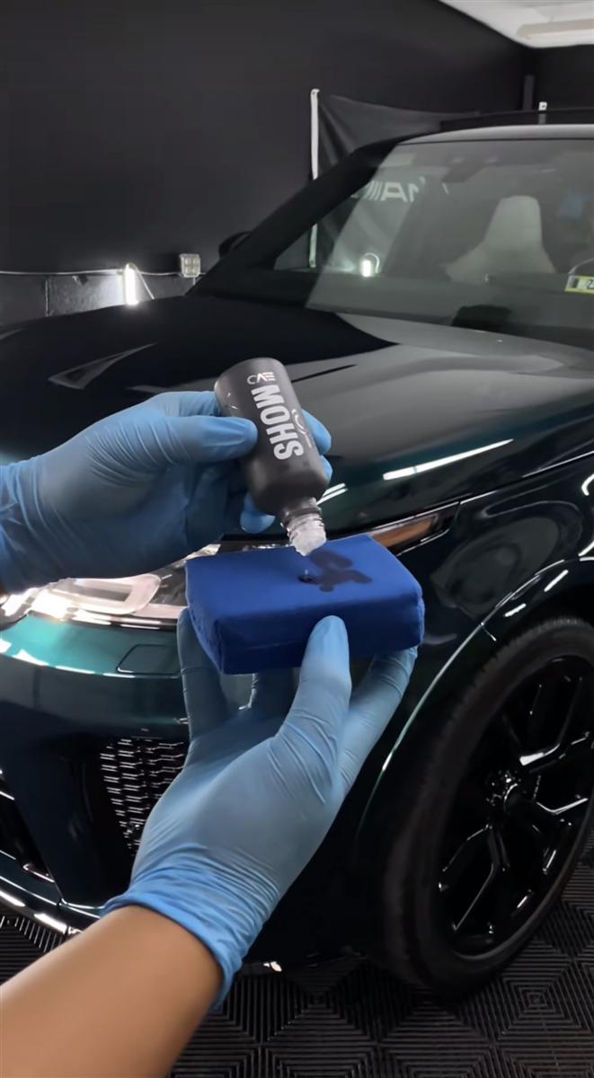 Applying professional ceramic coating by hand to a vehicle's paint